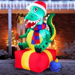 6ft Inflatable LED Christmas Dinosaur Sitting On A Gift